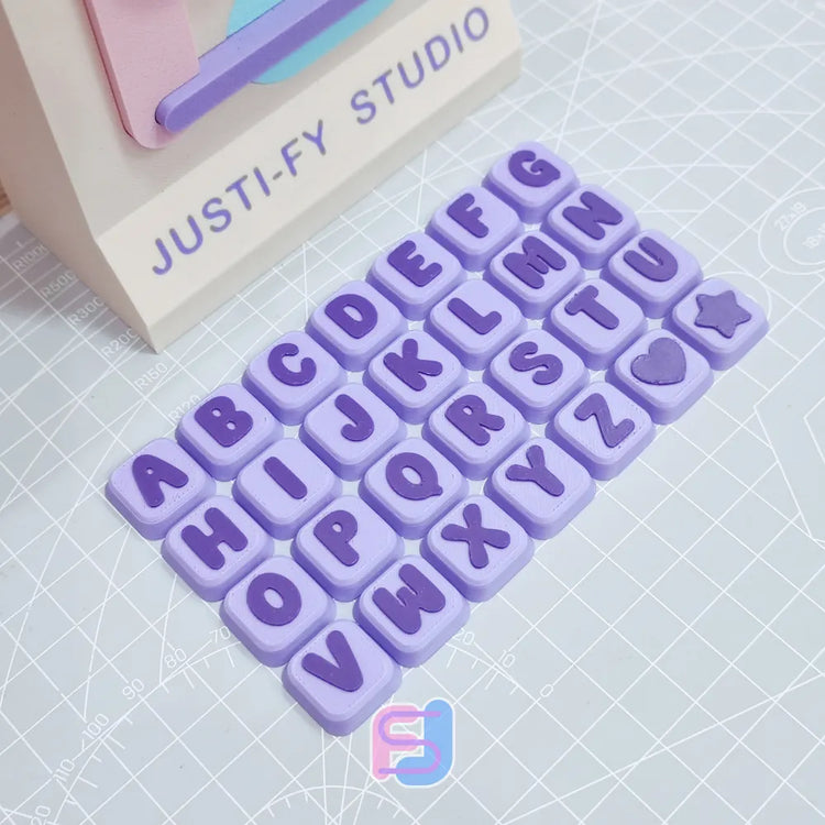 Alphabet clicker keychain pieces